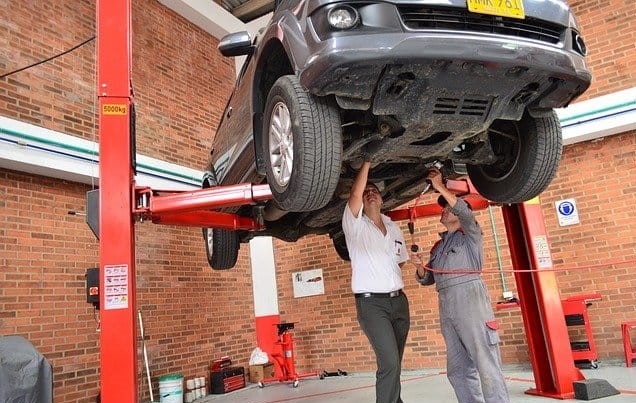 Mechanic fixing a car